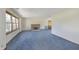 Spacious living room with a brick fireplace and ample natural light at 5913 W Maple Dr, Frankton, IN 46044