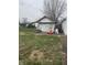 A functional shed provides extra storage space, located in backyard at 6206 W Us Highway 40, Stilesville, IN 46180