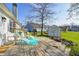 The home features a well-maintained backyard and deck area, perfect for outdoor activities and leisure at 6431 Meadowpond Way, Indianapolis, IN 46235