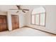 Bedroom with neutral carpeting, a window, and closet for organized storage at 6712 Forrest Commons Blvd, Indianapolis, IN 46227