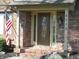 Attractive front entrance with brick steps, decorative door and sidelights and clearly marked address at 6712 Forrest Commons Blvd, Indianapolis, IN 46227