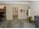 Spacious garage interior with a pedestrian door and window providing natural light at 6712 Forrest Commons Blvd, Indianapolis, IN 46227