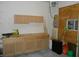 Spacious garage features lots of storage and a workshop area at 6712 Forrest Commons Blvd, Indianapolis, IN 46227
