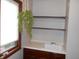 Mud room with a sink, cabinets, shelves, and a bright window at 6712 Forrest Commons Blvd, Indianapolis, IN 46227