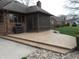 Relaxing screened-in patio with ample space for outdoor seating and a grill for entertaining at 6712 Forrest Commons Blvd, Indianapolis, IN 46227