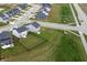 Aerial view of a neighborhood showcases well-manicured lawns and modern home designs at 6925 Sable Point Dr, Brownsburg, IN 46112