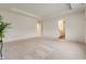 A primary bedroom offers an en suite bathroom and neutral carpeting at 6925 Sable Point Dr, Brownsburg, IN 46112