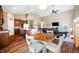 Open-concept living space boasts dining area, kitchen, and living room layout at 7574 Merrick Dr, Brownsburg, IN 46112