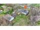 Charming home features a detached garage and a spacious yard, offering privacy and room for outdoor activities at 7609 Camby Rd, Indianapolis, IN 46113