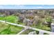 Picturesque view of a home nestled among mature trees, offering a serene setting and natural beauty at 7609 Camby Rd, Indianapolis, IN 46113
