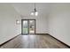 Dining area with wood flooring and french doors leading to the backyard at 7609 Camby Rd, Indianapolis, IN 46113