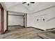 Bright living room with light wood floors, modern ceiling fan and minimalist décor at 7609 Camby Rd, Indianapolis, IN 46113