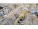 An overhead shot capturing a home and surrounding neighborhood, showcasing the tidy lawns and tree coverage at 920 Mellowood Dr, Indianapolis, IN 46217