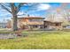 Spacious backyard with natural light, a concrete patio, and lush grass at 920 Mellowood Dr, Indianapolis, IN 46217