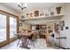 Dining area with wood table and chairs with a view of the fireplace in the next room at 920 Mellowood Dr, Indianapolis, IN 46217
