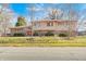 Charming two-story home with a combination brick and siding exterior and well-maintained landscaping at 920 Mellowood Dr, Indianapolis, IN 46217