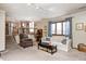 Carpeted Living room with view to the kitchen, dining room and staircase at 920 Mellowood Dr, Indianapolis, IN 46217