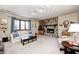 Spacious living room with fireplace and large windows at 920 Mellowood Dr, Indianapolis, IN 46217