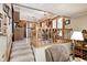 Open floor plan with kitchen, dining room and living room with a staircase at 920 Mellowood Dr, Indianapolis, IN 46217