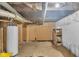 View of unfinished basement with plumbing and electrical features at 953 N Oakland Ave, Indianapolis, IN 46201
