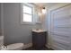 Clean bathroom features a modern vanity and decorative lighting for a relaxing ambiance at 953 N Oakland Ave, Indianapolis, IN 46201