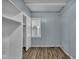 Bedroom featuring hardwood floors and a closet at 953 N Oakland Ave, Indianapolis, IN 46201