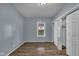 Cozy bedroom featuring hardwood floors, closet space, and natural light at 953 N Oakland Ave, Indianapolis, IN 46201