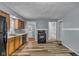 Kitchen with modern appliances, ample counter space, and a seamless connection to a back door and full bathroom at 953 N Oakland Ave, Indianapolis, IN 46201