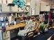 Well-organized basement workshop area with storage, workbench, and an ergonomic chair at 1030 Pamela Dr, Plainfield, IN 46168