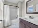 The bathroom features a shower-tub combo, and a vanity sink at 10603 Hinterland Dr, Fishers, IN 46038