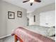 Bedroom features plush bed and double door access to other rooms at 10603 Hinterland Dr, Fishers, IN 46038