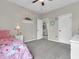 Cozy bedroom with cute decorations and view to other rooms at 10603 Hinterland Dr, Fishers, IN 46038