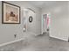 Hallway with neutral carpet leads to bedrooms and other living spaces at 10603 Hinterland Dr, Fishers, IN 46038