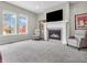 Bright living room with fireplace and lots of natural light at 10603 Hinterland Dr, Fishers, IN 46038