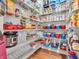 Well-organized pantry with ample shelving and storage for food and household items at 10603 Hinterland Dr, Fishers, IN 46038