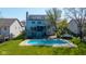 Inviting backyard with a pool, patio, and deck, perfect for outdoor relaxation and entertaining at 11050 Midnight Pass, Fishers, IN 46037
