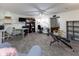 Finished basement with multiple desk and work areas and finished ceiling at 11050 Midnight Pass, Fishers, IN 46037