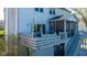 Outdoor patio with a comfortable seating area and access to a screened porch, perfect for relaxation at 11050 Midnight Pass, Fishers, IN 46037