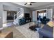 Open-concept living room with seamless flow to other spaces and lots of natural light at 11050 Midnight Pass, Fishers, IN 46037