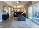 Inviting living room with a seamless transition to the kitchen and outdoor spaces at 11050 Midnight Pass, Fishers, IN 46037