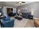 Comfortable living room with ample seating, neutral tones, and stylish decor for relaxation and gatherings at 11050 Midnight Pass, Fishers, IN 46037