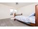Cozy bedroom with a comfortable bed and views from two bright windows at 12344 Bearsdale Dr, Indianapolis, IN 46235