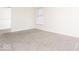 Bright bedroom with plush carpet, bright walls, and lots of natural light at 12344 Bearsdale Dr, Indianapolis, IN 46235