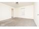 Spacious bedroom with neutral carpet, natural light, and walk-in closet at 12344 Bearsdale Dr, Indianapolis, IN 46235