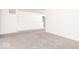 Bright hallway with plush carpet, bright walls, and access to other rooms at 12344 Bearsdale Dr, Indianapolis, IN 46235