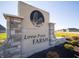 Entrance to the Lone Pine Farms community with attractive signage and landscaping at 1378 Foxtail Ln, Greenwood, IN 46143