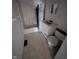Modest bathroom with a toilet, sink, mirror, and shower at 1524 Ohio Ave, Anderson, IN 46016
