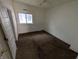 Small bedroom featuring carpeting and a window at 1524 Ohio Ave, Anderson, IN 46016
