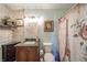 Cozy bathroom with a sink and vanity, toilet, and a bathtub with shower at 16371 State Road 38 E, Noblesville, IN 46060