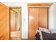 Bedroom with hardwood floors features a door and closet at 16371 State Road 38 E, Noblesville, IN 46060